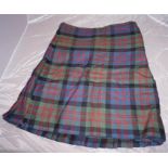 3 Kilts, 2 tartan 1 black, pair of tartan trousers, pair of white socks, shirt, tartan bowtie, sporr