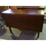 A mahogany drop leaf table