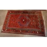 Oriental Rug - Red, blue and ivory. 54" x 85".