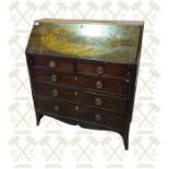 A Georgian inlaid mahogany fall front bureau with 5 graduating drawers, brass guilt pulls