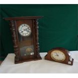 German spring wall clock in mahogany stained case and a Edwardian inlaid mahogany cased mantle clock