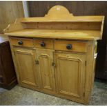 19th Century Scotch Pine Dresser, with 3 drawers above 2 cupboards, shaped top back and sides