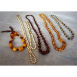 Nine assorted strings of glass and costume bead necklaces