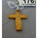 9ct Gold cross pendant, with link to the top, with engraved chased foliage to the obverse 3.5 grams