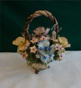 A large Capo-Di-Monte basket of flowers 12" x 11"
