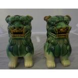 A pair of Chinese pottery dog of foe figures