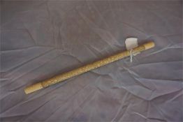 A late 19th century carved ivory baton
