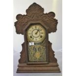 American gingerbread mantle clock and a piece of treen ware from Pitcairn Island, candle and match h