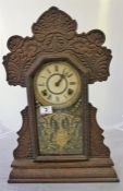 American gingerbread mantle clock and a piece of treen ware from Pitcairn Island, candle and match h