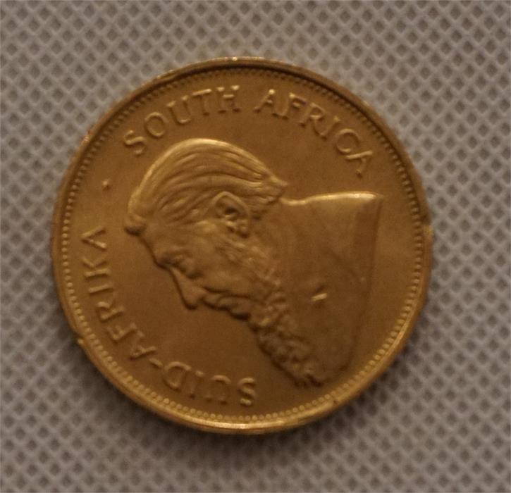 A South African Krugerrand 1oz Gold coin, dated 1975.