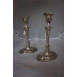 Pair of silver candlesticks, hallmarks for D.J Silver Repairs London 1904, 30cm high (2)
