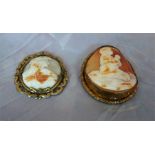 Two Victorian cameo brooches, one a female bust and the other a figure praying 6cm and 8cm high