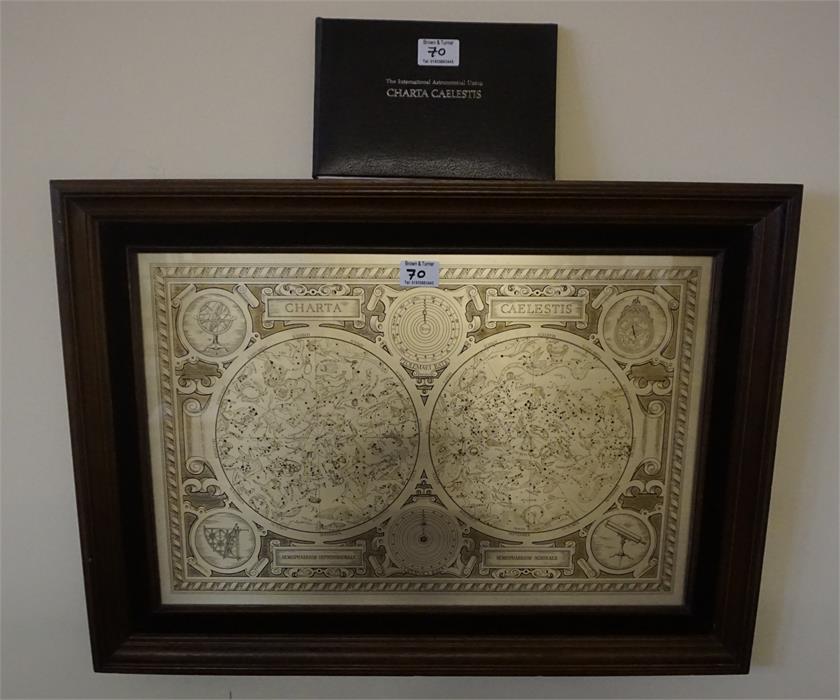 A framed constellation map by the Franklin mint, with booklet