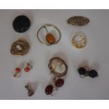 Lot of Brooches and earrings, including amber set, pinch back, silver, jet and 15ct gold mount