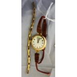 An Edwardian ladies 9 ct gold wrist watch, with roman numerals and second hand in working condition