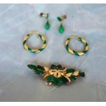 Five pieces of unmarked gold and jadeite jewellery