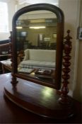 A late Victorian mahogany dressing table mirror, with barley twist supports