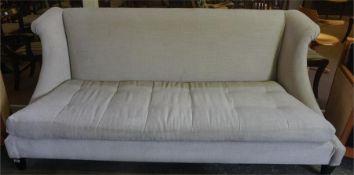 Modern fabric covered three seater sofa