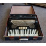 A Hohner "Verdi IV" Accordion with fitted box