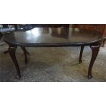 An Edwardian mahogany D-End extending dining table