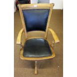 Early 19th century Ash revolving desk chair, with hide covered seat