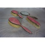 Silver and pink enamel 4 piece dressing table set, comprising of two ladies brushes,