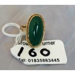 A 9ct gold ladies dress ring, set with a green agate, stone size K1/2
