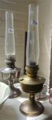 Three Paraffin lamps with glass funnels