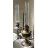 Three Paraffin lamps with glass funnels