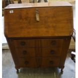 A William IV Mahogany pedestal tea table,raised on platform base and a walnut Bureau