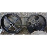 Two Black Painted Cast Iron Wheels, one named to Bellow & Son, 37cm diameter, (2)