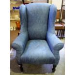 A Late 19th Century Upholstered Wing Armchair