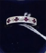 A Ladies 9ct White Gold Dress Ring, set with rubies & diamonds, half hoop style, ring size N
