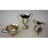 Two Silver Cream Jugs And a Silver Cup