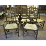 A Set Of Twelve Lancashire Style Spindle Back Dining Chairs