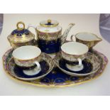 A 19th Century Eight Piece Porcelain Tea For Two/ Matinee Set