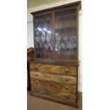 A George III Mahogany Bookcase On Secretaire Chest Of Drawers