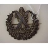 A Scottish White Metal Clan Badge For The Cameron Highlanders