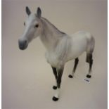 A Large Beswick Figure Of A Dapple Grey Horse