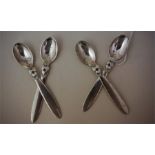 A Set Of Four Danish Silver Coffee Spoons By Georg Jensen