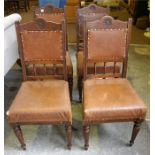 A Set Of Four Edwardian Oak Dining Chairs