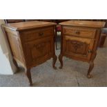 A Pair Of French Oak Bedside Cabinets