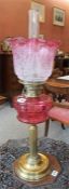 A Late Victorian Brass Corinthian Style Oil Lamp