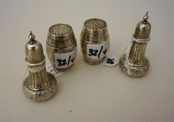 A Pair Of Victorian Silver Pepper Pots