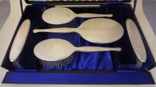 A Silver Backed Six Piece Brush Set