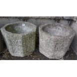 A Pair Of Octagonal Stone Planters, 25cm high, 27cm diameter