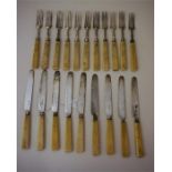 A Set Of Twenty George IV Silver Bladed Pickle Knives and Forks