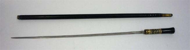 An Anglo Indian Ebony & Bone Sword Stick, circa late 19th century, engraved India to blade, the