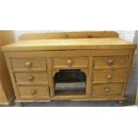 A Victorian Pine Dresser Base, with associated plank top above fitted drawers and open recess,