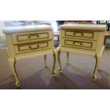 A Pair Of French Painted Bedside Cabinets, painted in cream and gilt, with two drawers, 62cm high,